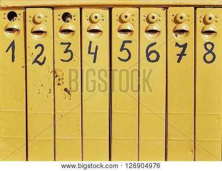 eight old mail boxes from one to eight