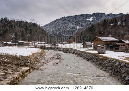 View over a river in Loisach Valley, Garmisch-Partenkirchen, Germany