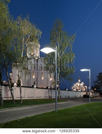 The temple and the fence and street lamps. Architectural lighting.