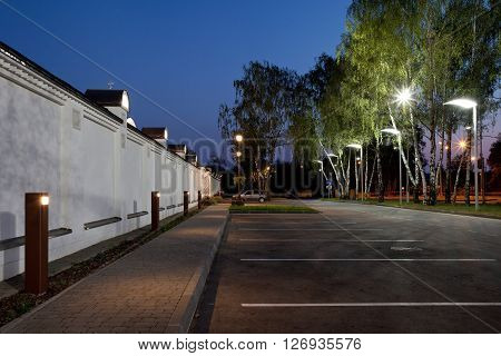 Parking next to orthodox temple complex. Architectural lighting.