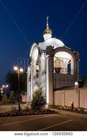 Orthodox temple complex. Architectural lighting. Street lamp and bell tower.