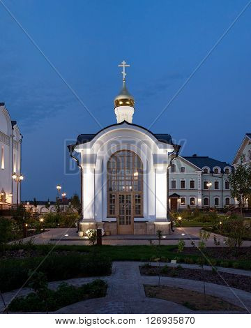 The orthodox baptistery chapel. Evening architectural lighting.