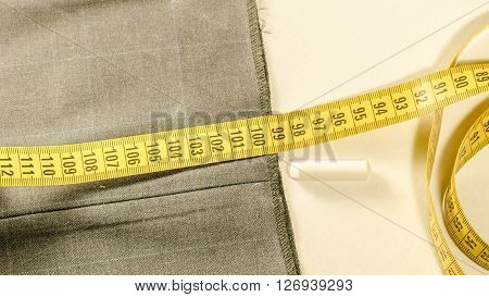still life with a tape measure a chalk and tissue