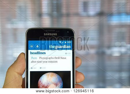 MONTREAL CANADA - MARCH 20 2016 - The Guardian newspaper mobile application on Samsung S5's screen. The Guardian is a British national daily newspaper.