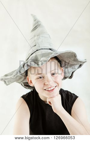 Happy Boy Wearing Gray Pointed Hat