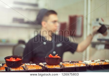 Cooks Preparing Sush