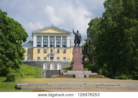View of the monument to Lenin on a background of an urban high school in Zelenogorsk. The resort district of St. Petersburg