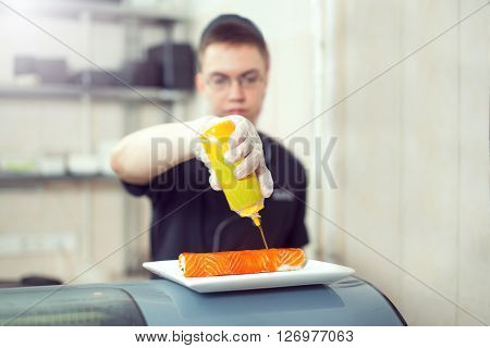 Cooks Preparing Sush