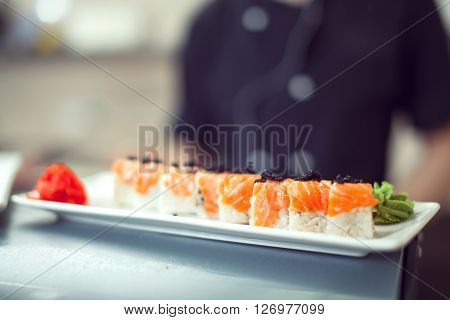 Cooks Preparing Sush