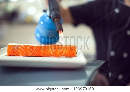 Cooks Preparing Sushi