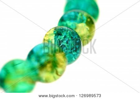 Glass colour bracelet on white isolated background
