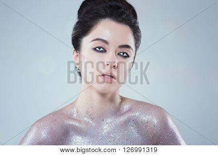 Potrtait of woman with beautiful creative fashion makeup