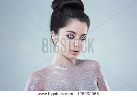 Potrtait of woman with beautiful creative fashion makeup