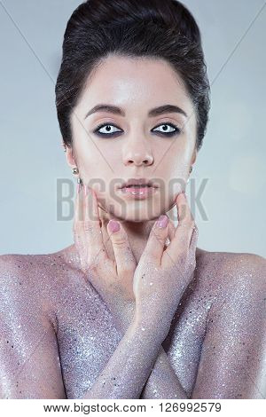 Potrtait of woman with beautiful creative fashion makeup