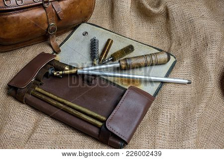 Ramrod Kit For Cleaning Gun With Different Brushes And Addons.