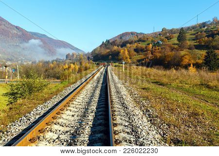 Autumn Carpathian Mountains Misty Landscape With  Railroad Bridge And Village Outskirts (rakhiv Dist