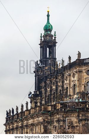 Old City, Dresden. An Ancient Clock Tower Of The Royal Palace. Ancient Architecture Of Germany