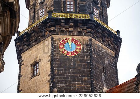 Old City, Dresden. An Ancient Clock Tower Of The Royal Palace. Ancient Architecture Of Germany