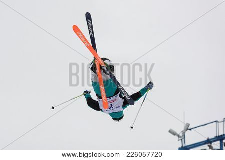 KRASNOE OZERO, LENINGRAD REGION, RUSSIA - FEBRUARY 1, 2018: Michail Dolmatov of Russia competes in dual mogul during Freestyle Europa Cup competitions. Dolmatov takes 8th place