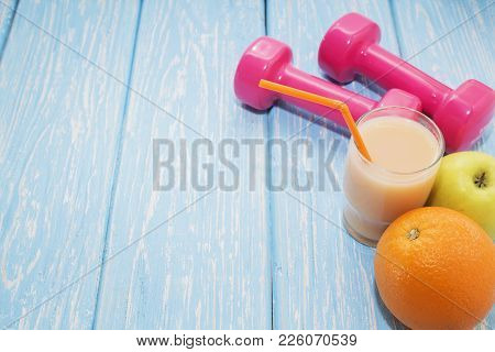 The Concept Of A Healthy Diet. Small Dumbbells, Juice. Oranges. Apples. Healthy Lifestyle. Sport Fit