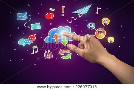 Female hand toucing mixed media icons with purple background