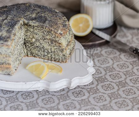 A Piece Of Cake With Poppy Seeds And Lemon Cream. Toned.