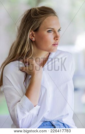 Young Attractive Women Looking Away From Camera.