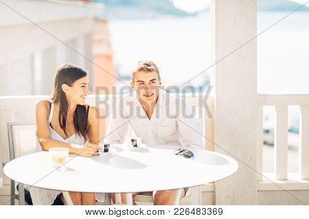 Attractive Couple Having First Date.blind Date.coffee With A Friend.smiling Happy People Having A Co