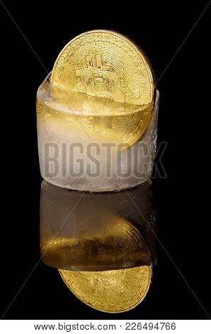 Golden Bitcoin Frozen In The Ice As A Concept Of Restrictions