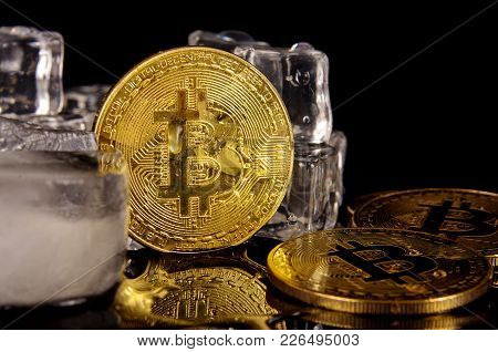 Bitcoin Coin Surrounded By Ice Cubes As A Concept Of Restrictions