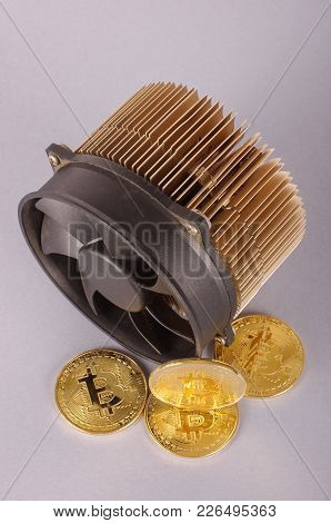 Bitcoin Miner And Golden Symbolic Bitcoin Coins