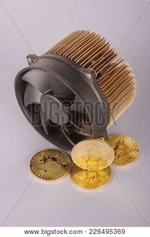 Bitcoin Miner And Golden Symbolic Bitcoin Coins