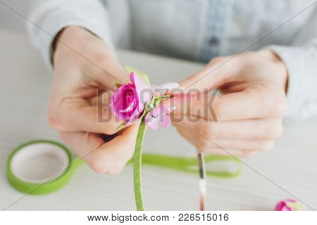 Florist Does A Wreath With Artificial Flowers From Foamiran