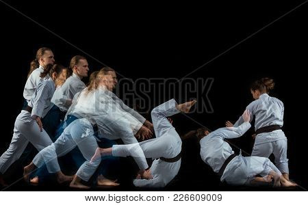 Man And Woman Fighting At Aikido Training In Martial Arts School. Healthy Lifestyle And Sports Conce