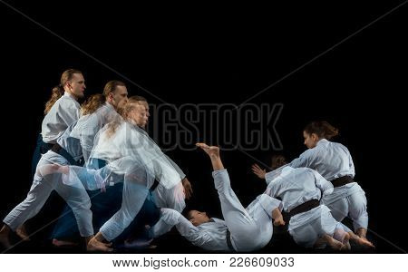 Man And Woman Fighting At Aikido Training In Martial Arts School. Healthy Lifestyle And Sports Conce