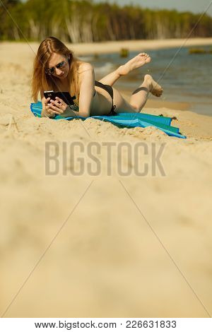 Summertime Pleasures, Enjoying Vacation Concept. Woman In Bikini Sunbathing And Relaxing On Beach, U