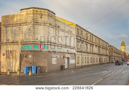 Clydebank, Scotland - January 20, 2018: A Sandstone Tenement Next To The Lucky Break Snooker Club On