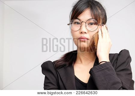 Business Women Talking With Smartphone Wear Suit And Gogles