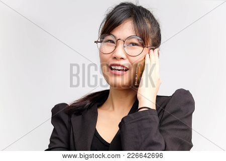 Business Women Talking With Smartphone Wear Suit And Gogles
