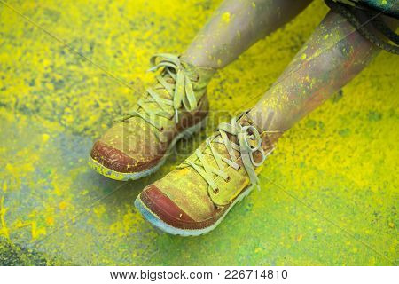 The Colorful Shoes And Legs Of Teenagers At Color Run Event