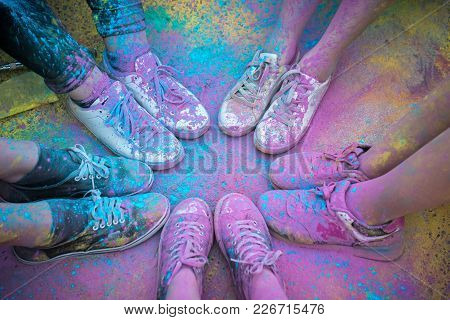 The Colorful Shoes And Legs Of Teenagers At Color Run Event