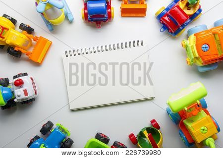 Kids Educational Developing Toys Frame On White Background. Top View. Flat Lay. Copy Space For Text.