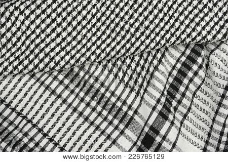 Background Texture, Pattern. Scarf Wool Like Yasser Arafat. The Palestinian Keffiyeh Is A Gender-neu