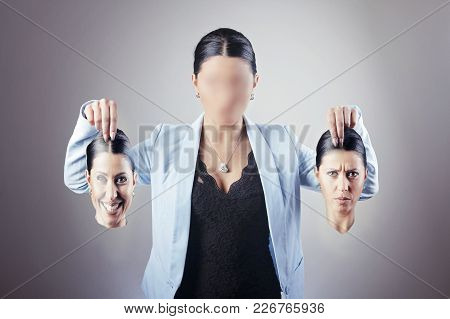 Business Woman With The Identity Disorder