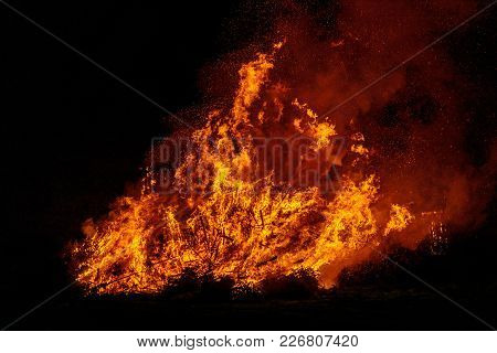 Big Bonfire With Smoke. Flames Of A Campfire In The Night.