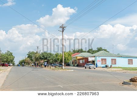 Excelsior, South Africa, February 9, 2018: A Street Scene, With Supermarket And People, In Excelsior