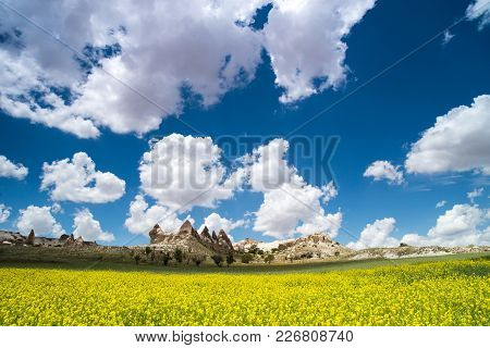 Love Valley In Goreme Village, Turkey. Rural Cappadocia Landscape. Stone Houses In Goreme, Cappadoci