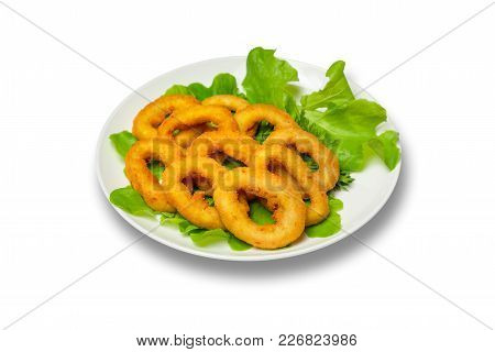 Onion Rings With Lettuce On A Plate. White Background