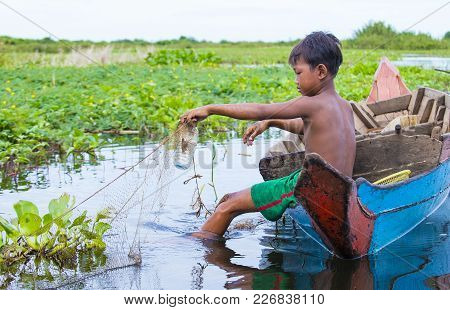 Tonle Sap , Cambodia - Oct 18 : Cambodian Children In Tonle Sap Lake Cambodia On October 18 2017. To