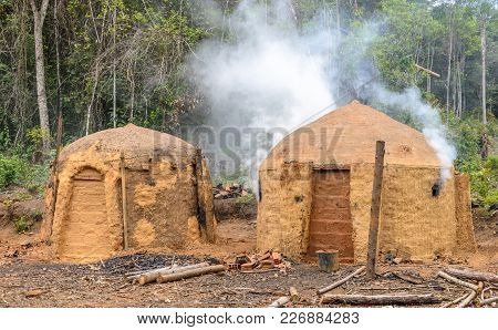 Charcoal Kilns On The Eucalyptus Farm In Minas Gerais , Brazil.